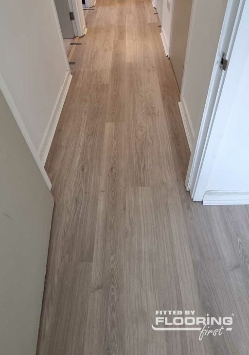 QuickStep ELIGNA Light Grey Varnished Oak Laminate Flooring 8mm Image 2